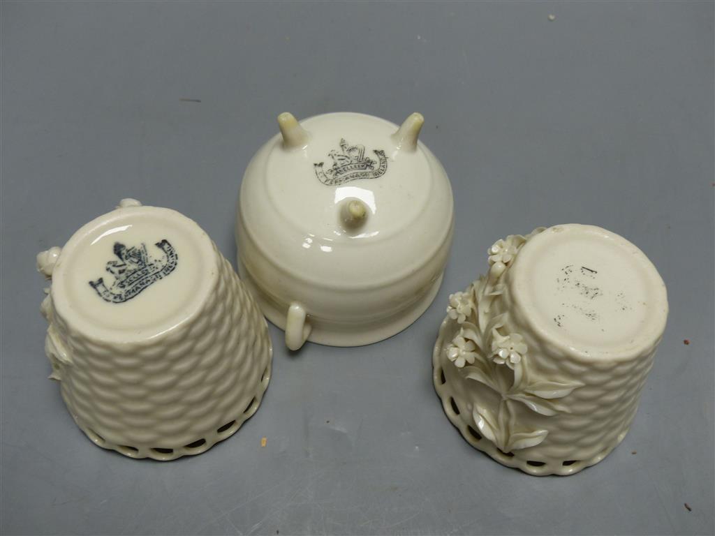 A Belleek cauldron and a pair of Belleek pots, tallest 6cm